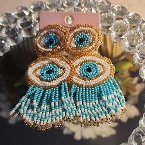 Blue and Gold Eye-Shaped Fringe Earrings